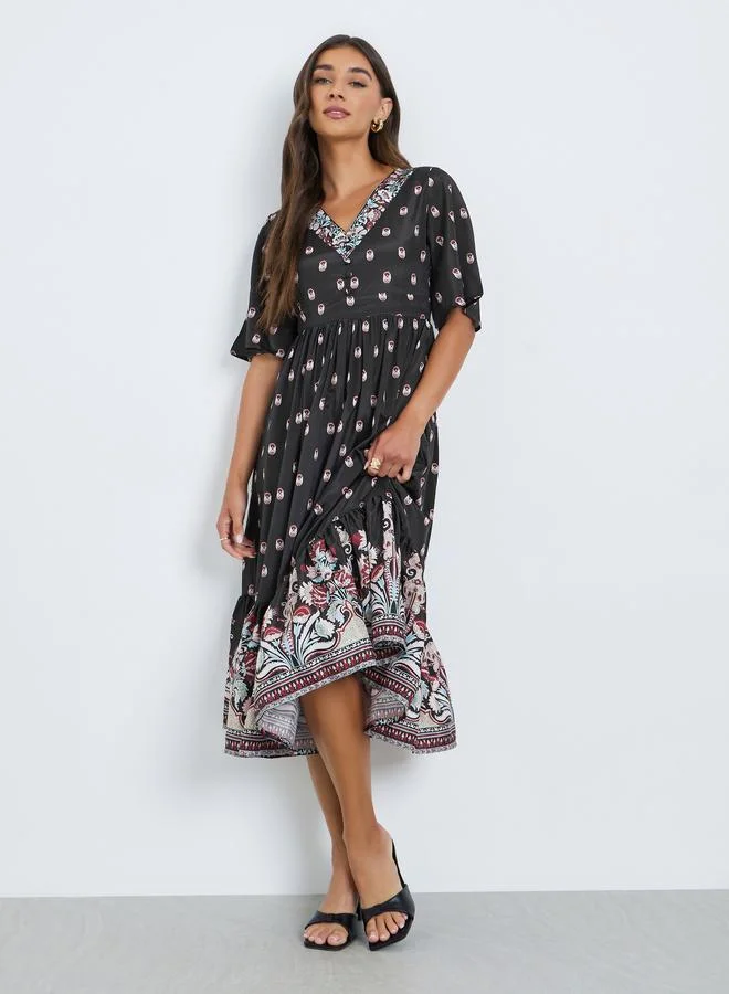 ستايلي فستان ميدي بتصميم مريح وطبعة زهور أسود